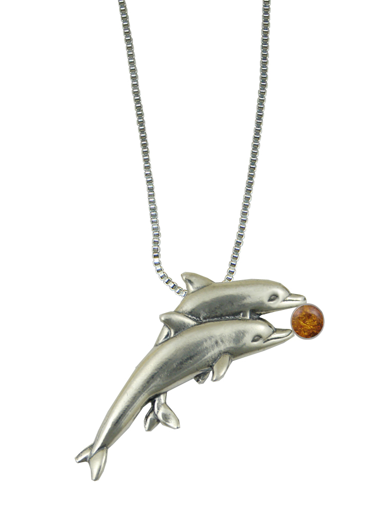Sterling Silver Pair of Dolphins Pendant With Amber